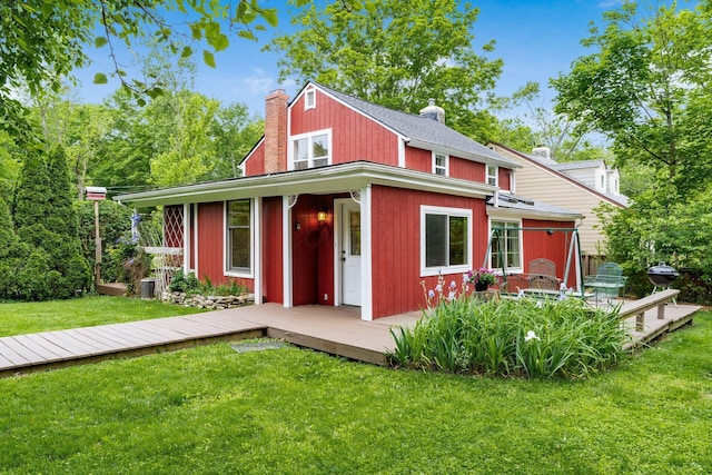796 Mulberry Dr, Columbus, OH 43235 - view of front of property featuring a chimney, a deck, and a front lawn