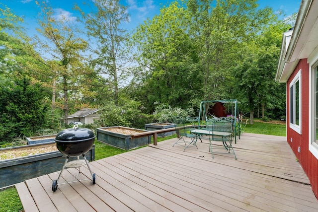 796 Mulberry Dr, Columbus, OH 43235 - wooden terrace featuring outdoor dining space and view of scattered trees