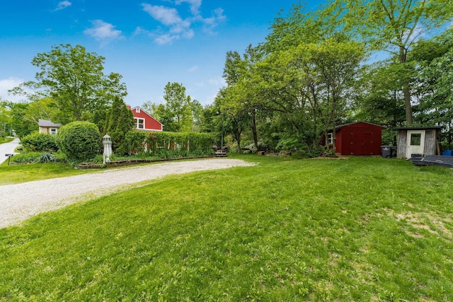 796 Mulberry Dr, Columbus, OH 43235 - view of green lawn featuring driveway