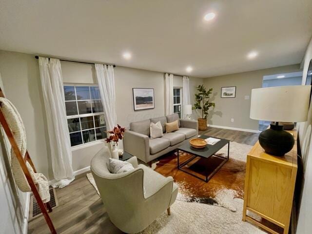 79 N Main St, Jeffersonville, OH 43128 - living area with wood finished floors, recessed lighting, and baseboards