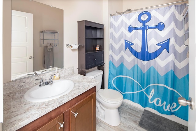 7326 State Route 19 Unit 9, Lot 297, Mount Gilead, OH 43338 - bathroom with toilet, vanity, wood finished floors, and a shower with shower curtain