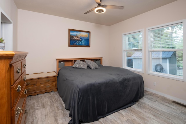 7326 State Route 19 Unit 9, Lot 297, Mount Gilead, OH 43338 - bedroom featuring light wood-style floors, baseboards, and a ceiling fan