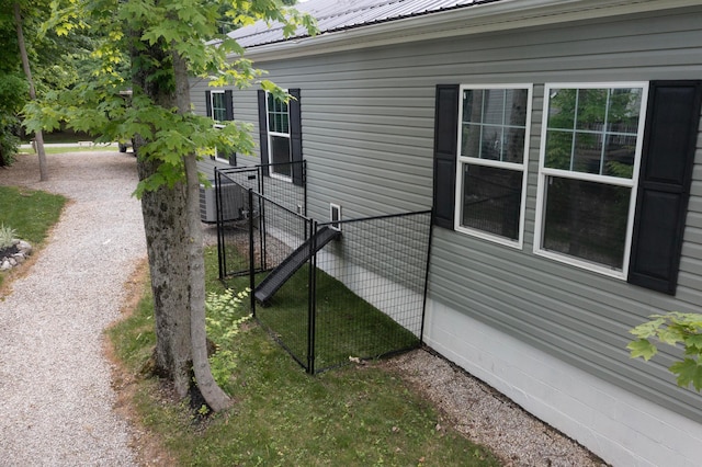 7326 State Route 19 Unit 9, Lot 297, Mount Gilead, OH 43338 - view of side of property featuring a gate and metal roof