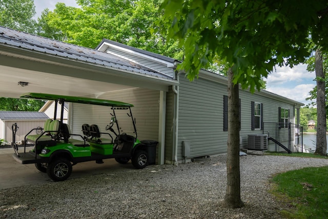 7326 State Route 19 Unit 9, Lot 297, Mount Gilead, OH 43338 - view of side of property featuring cooling unit and metal roof