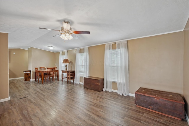 8 Winter Pine Dr, Delaware, OH 43015 - dining space with ceiling fan, wood finished floors, and vaulted ceiling