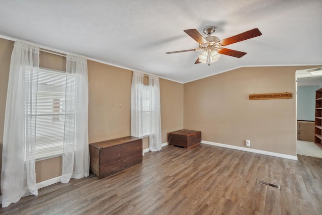 8 Winter Pine Dr, Delaware, OH 43015 - empty room featuring wood finished floors, ceiling fan, and vaulted ceiling