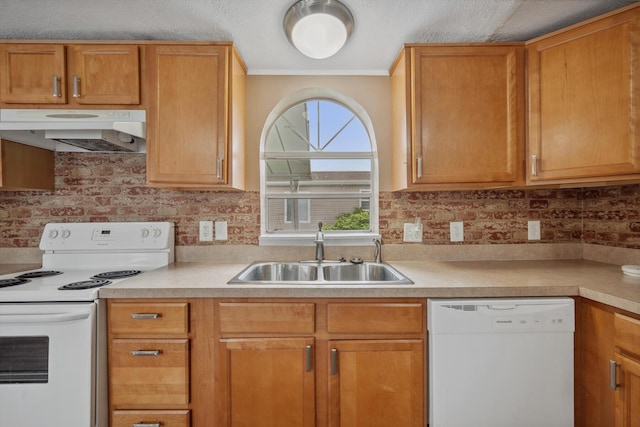 8 Winter Pine Dr, Delaware, OH 43015 - kitchen with white appliances, under cabinet range hood, light countertops, ornamental molding, and decorative backsplash