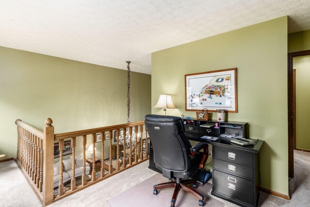 5584 Tangarey Ct, Columbus, OH 43235 - carpeted home office with a textured ceiling and baseboards