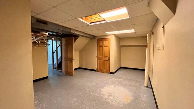 5459 Red Wynne Ln, Hilliard, OH 43026 - finished basement featuring a paneled ceiling and baseboards
