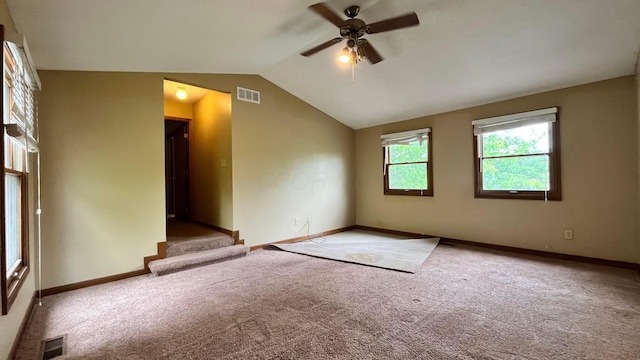5459 Red Wynne Ln, Hilliard, OH 43026 - carpeted spare room featuring vaulted ceiling, a ceiling fan, baseboards, and stairway