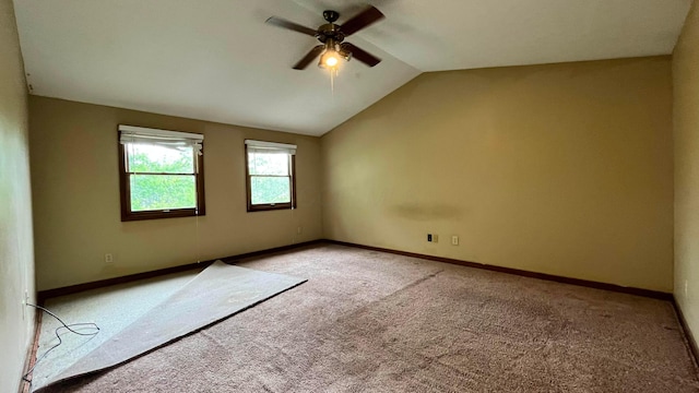5459 Red Wynne Ln, Hilliard, OH 43026 - spare room with a ceiling fan, light colored carpet, vaulted ceiling, and baseboards