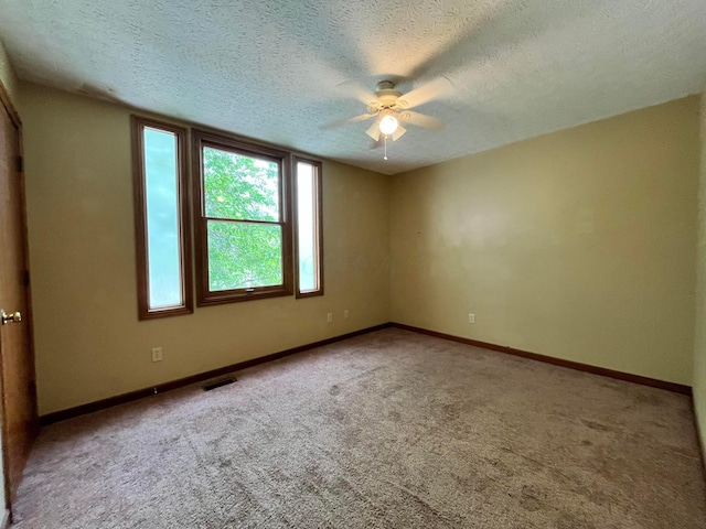 5459 Red Wynne Ln, Hilliard, OH 43026 - unfurnished room featuring a ceiling fan, a textured ceiling, carpet, and baseboards