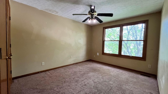 5459 Red Wynne Ln, Hilliard, OH 43026 - carpeted empty room with a textured ceiling, baseboards, and a ceiling fan