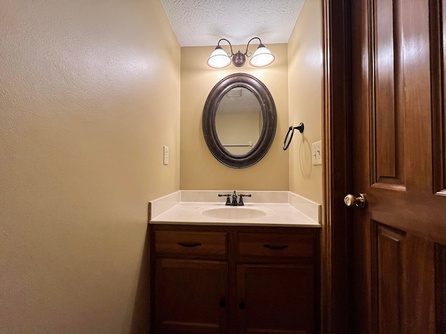 5459 Red Wynne Ln, Hilliard, OH 43026 - bathroom with vanity and a textured ceiling