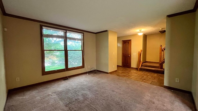 5459 Red Wynne Ln, Hilliard, OH 43026 - carpeted empty room featuring baseboards, ornamental molding, and stairs