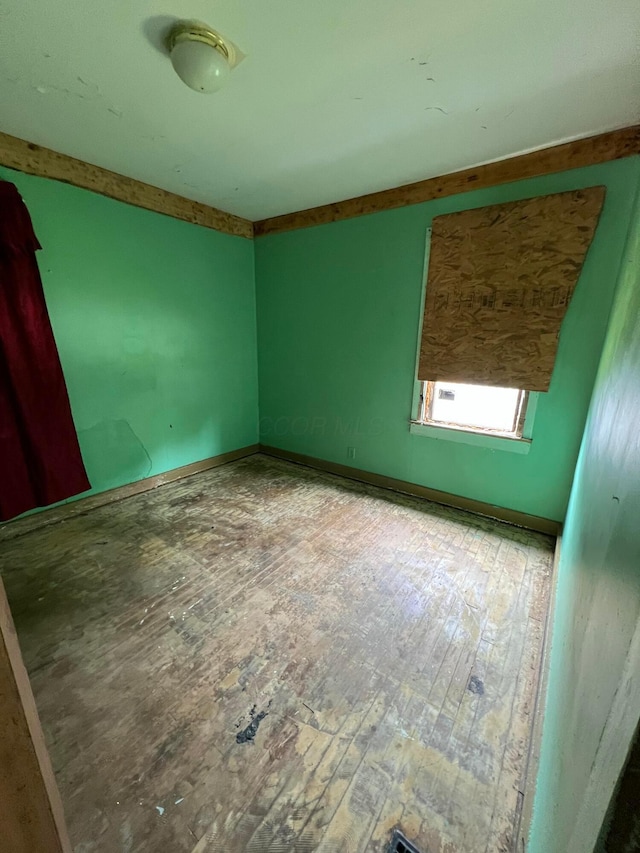 527 N 15th St, Coshocton, OH 43812 - spare room with hardwood / wood-style floors
