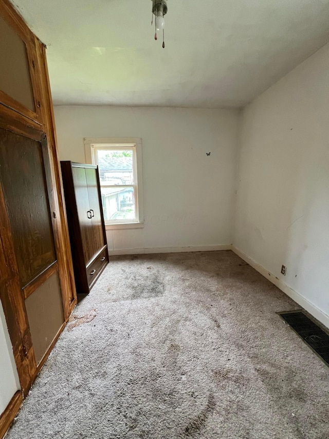 527 N 15th St, Coshocton, OH 43812 - unfurnished bedroom with carpet and baseboards