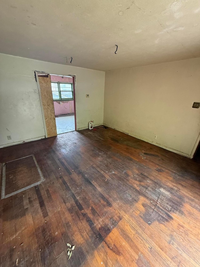 527 N 15th St, Coshocton, OH 43812 - spare room with hardwood / wood-style floors