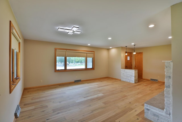465 W Schrock Rd, Westerville, OH 43081 - unfurnished living room with light wood-style flooring, recessed lighting, and baseboards