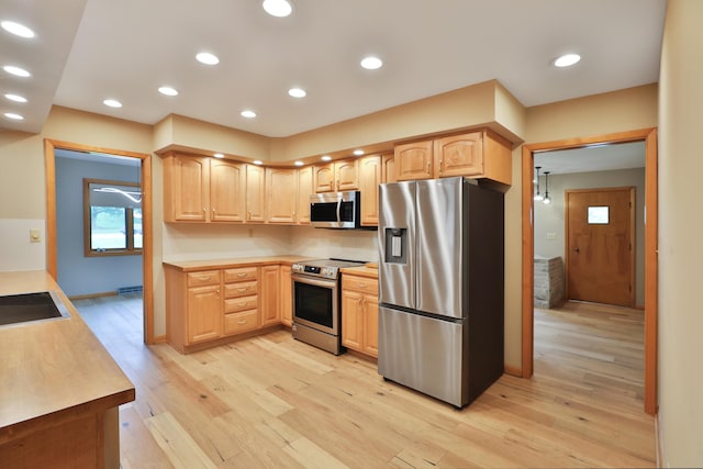 465 W Schrock Rd, Westerville, OH 43081 - kitchen with appliances with stainless steel finishes, light brown cabinetry, light wood-type flooring, and recessed lighting