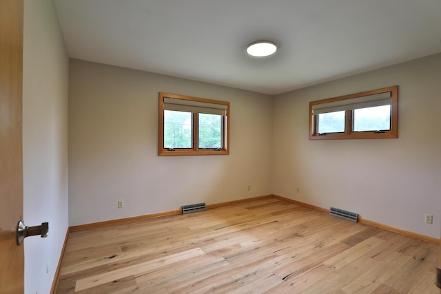465 W Schrock Rd, Westerville, OH 43081 - unfurnished room featuring plenty of natural light, light wood-type flooring, and baseboards