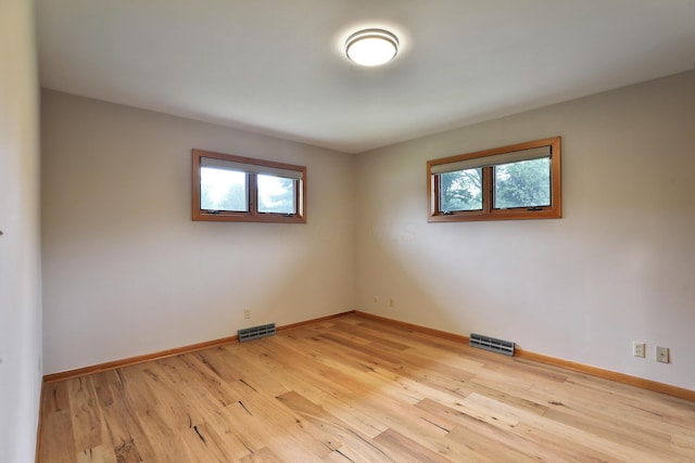 465 W Schrock Rd, Westerville, OH 43081 - empty room featuring healthy amount of natural light, light wood finished floors, and baseboards