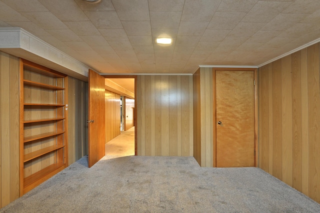 465 W Schrock Rd, Westerville, OH 43081 - unfurnished bedroom featuring carpet, wooden walls, and ornamental molding