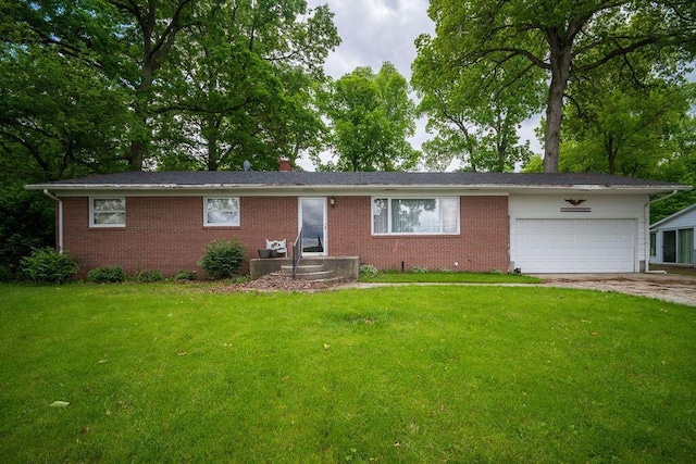 815 Irvin Shoots Rd E, Marion, OH 43302 - ranch-style home with a garage, a front yard, brick siding, and concrete driveway