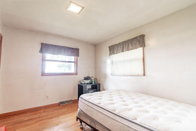 815 Irvin Shoots Rd E, Marion, OH 43302 - bedroom featuring light wood-type flooring and baseboards