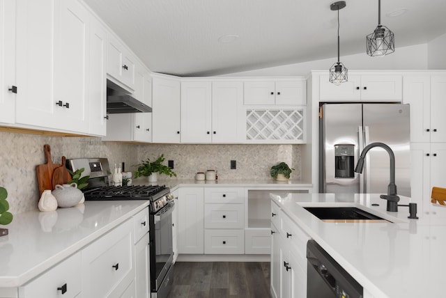 25 Vernon Ave, London, OH 43140 - kitchen with appliances with stainless steel finishes, ventilation hood, a sink, light countertops, and lofted ceiling