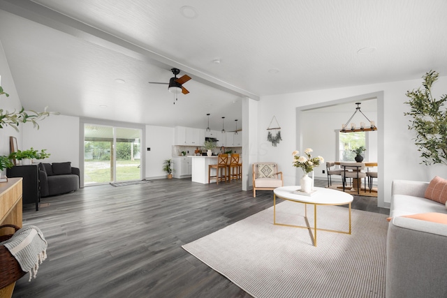 25 Vernon Ave, London, OH 43140 - living area with dark wood-style flooring, ceiling fan, and a chandelier