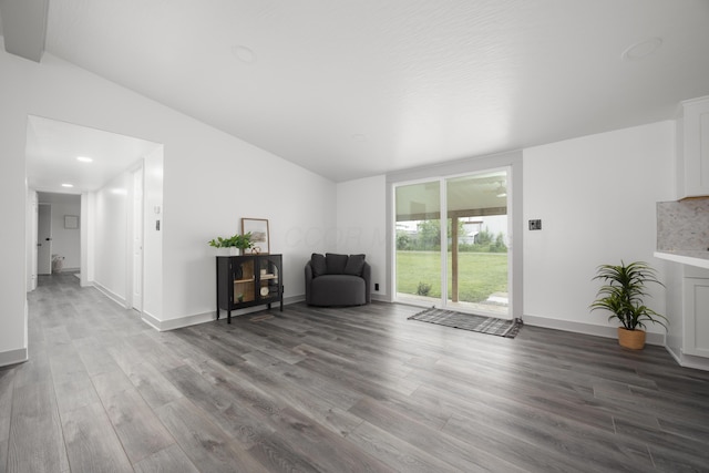 25 Vernon Ave, London, OH 43140 - sitting room with vaulted ceiling, wood finished floors, baseboards, and recessed lighting