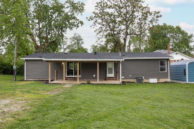 25 Vernon Ave, London, OH 43140 - back of house featuring cooling unit, a lawn, and a patio