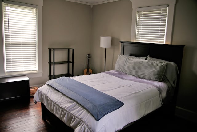632 E 5th Ave, Lancaster, OH 43130 - bedroom featuring hardwood / wood-style floors and ornamental molding
