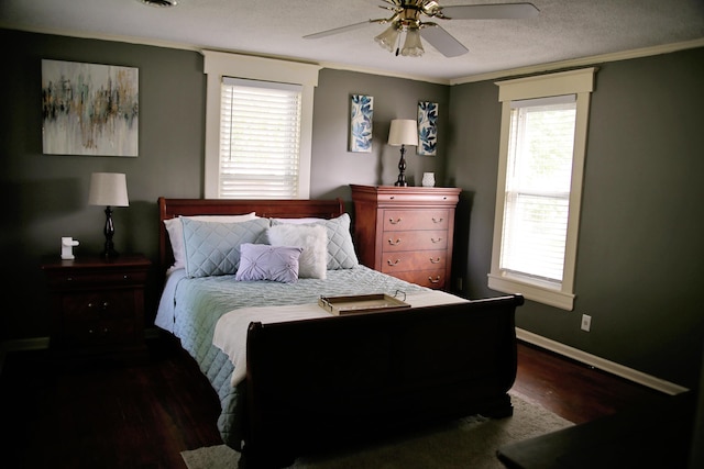 632 E 5th Ave, Lancaster, OH 43130 - bedroom with wood finished floors, crown molding, baseboards, multiple windows, and a ceiling fan