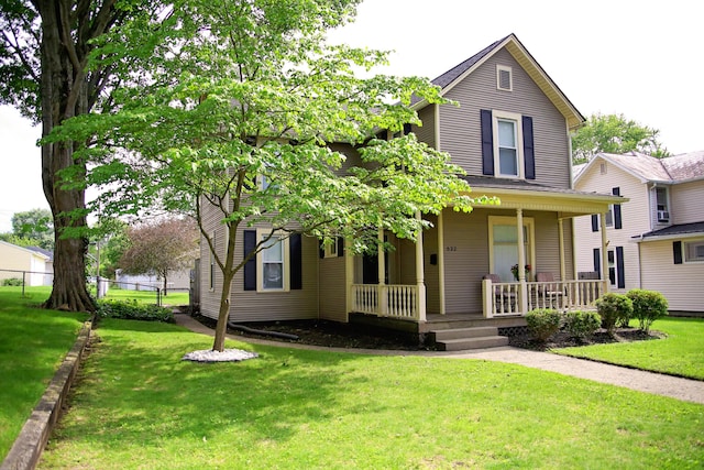 632 E 5th Ave, Lancaster, OH 43130 - view of front facade featuring covered porch