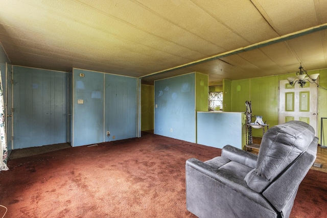 11095 High Point Rd, Thornville, OH 43076 - carpeted living room featuring wooden walls
