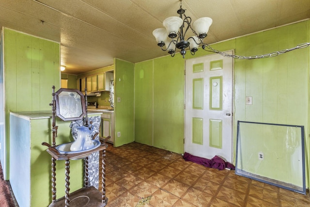 11095 High Point Rd, Thornville, OH 43076 - kitchen with a chandelier and light countertops