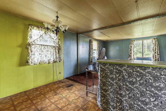 11095 High Point Rd, Thornville, OH 43076 - dining room featuring a chandelier and wooden walls