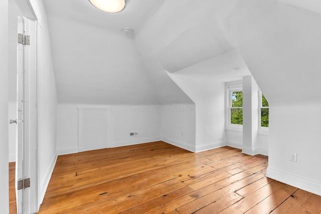 429 S Champion Ave, Columbus, OH 43205 - additional living space featuring hardwood / wood-style floors, lofted ceiling, and baseboards