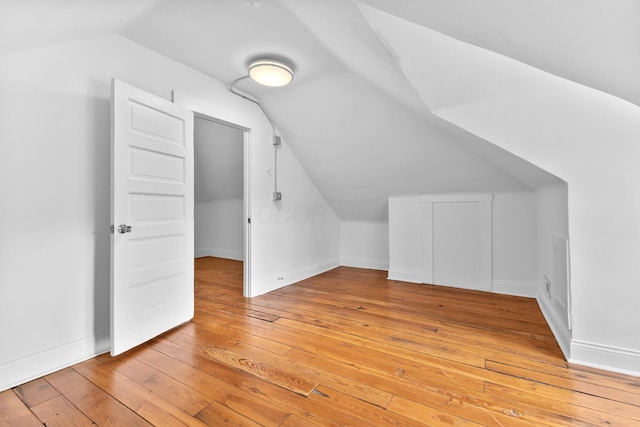 429 S Champion Ave, Columbus, OH 43205 - additional living space with vaulted ceiling, light wood-style flooring, and baseboards