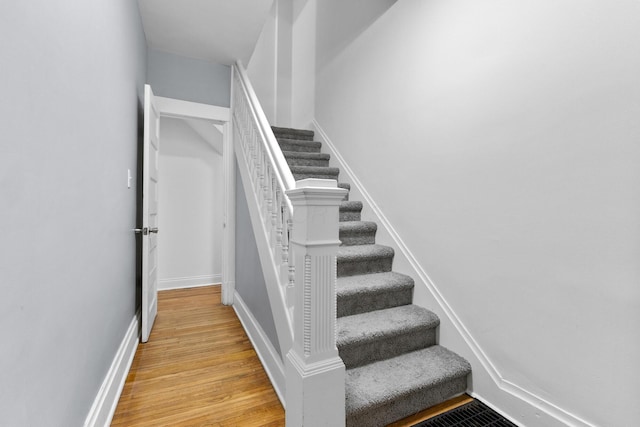429 S Champion Ave, Columbus, OH 43205 - stairway featuring wood finished floors and baseboards