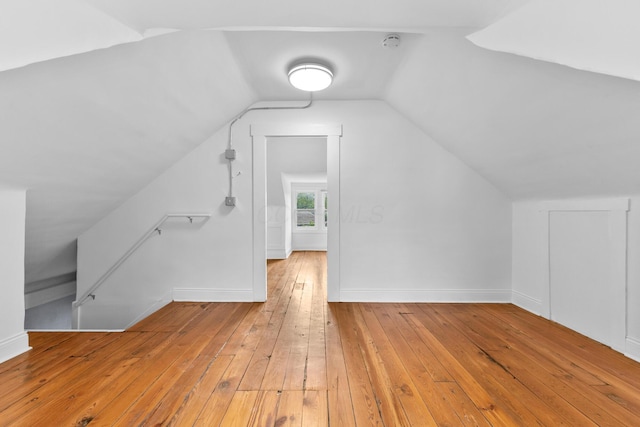 429 S Champion Ave, Columbus, OH 43205 - additional living space with hardwood / wood-style flooring, vaulted ceiling, and baseboards
