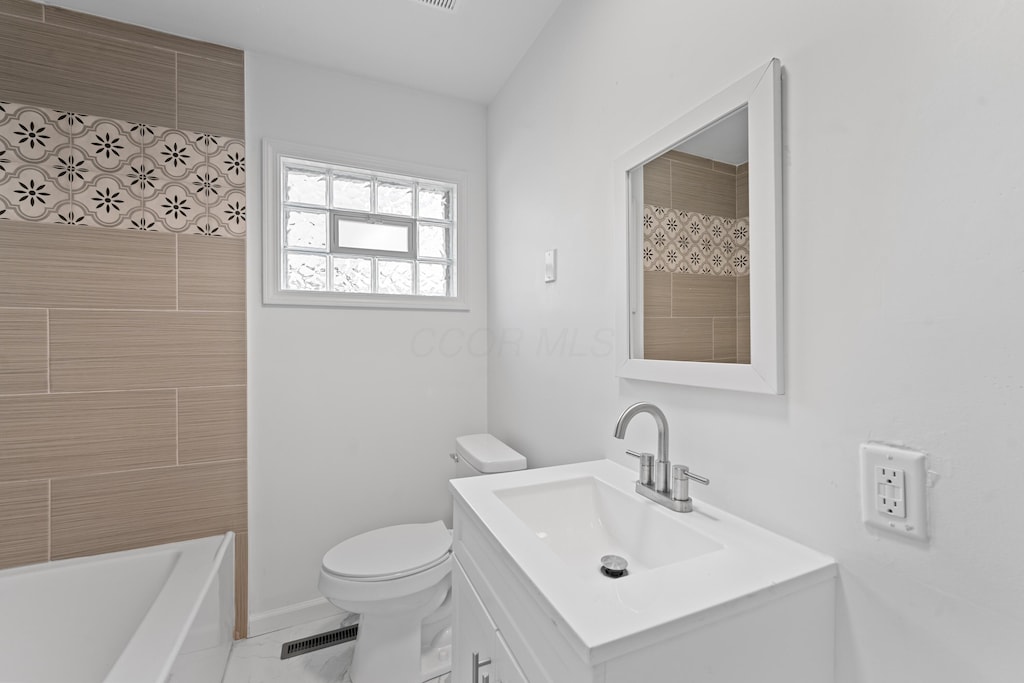 2345 Hanna Dr, Columbus, OH 43211 - bathroom featuring vanity and toilet