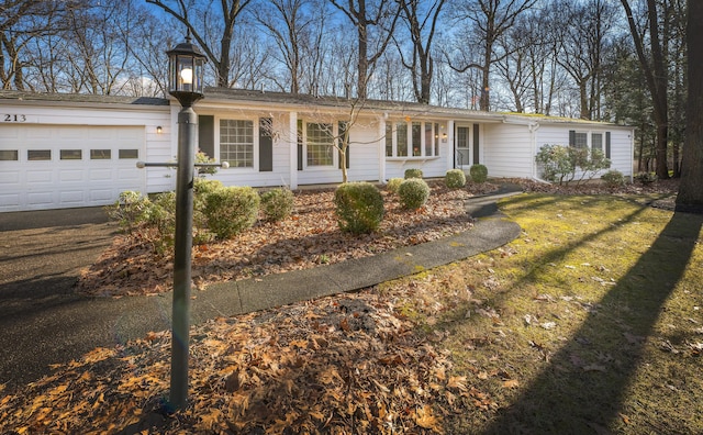 213 Kokosing Dr, Gambier, OH 43022 - ranch-style house with an attached garage
