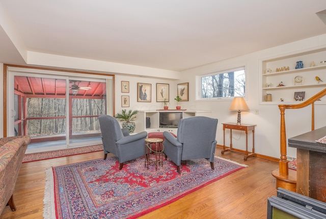 213 Kokosing Dr, Gambier, OH 43022 - living area featuring wood finished floors, ceiling fan, and baseboards