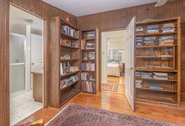 213 Kokosing Dr, Gambier, OH 43022 - hallway with wood finished floors and wooden walls