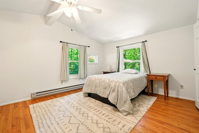 213 Kokosing Dr, Gambier, OH 43022 - bedroom featuring a baseboard heating unit, wood finished floors, baseboards, and a ceiling fan