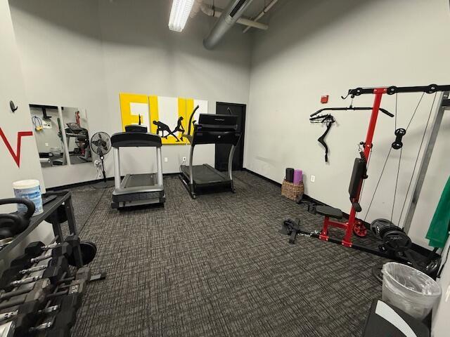 110 N 3rd St Unit 709, Columbus, OH 43215 - exercise room featuring a towering ceiling