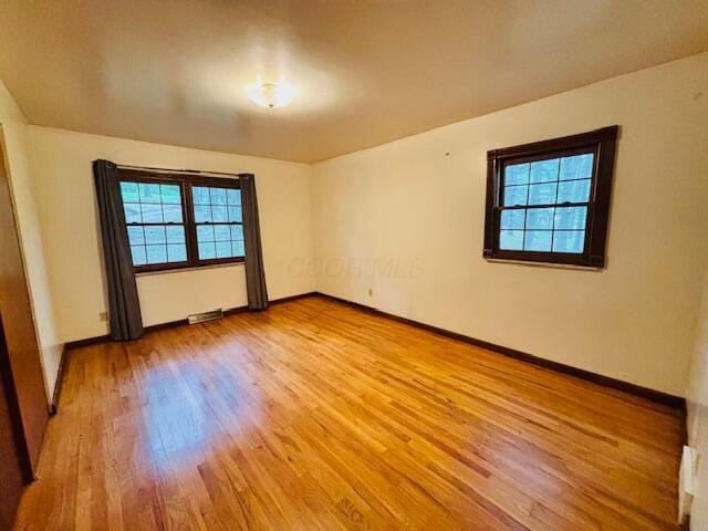 91 Bridle Path Ln, Granville, OH 43023 - spare room featuring light wood-style floors and baseboards